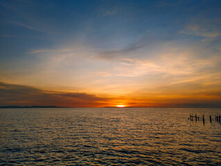 lombok indonesia : sunset under the sky lombok beach ampenan nusa barat southeast, sunsite 23 january 2023