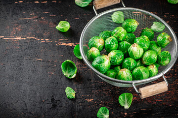 Brussels sprouts in a colander. 