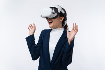 Happy young Asian businesswoman working in virtual reality environment in VR glasses touching virtual interface isolated on white background.