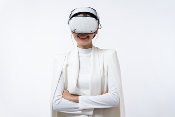 Happy young Asian businesswoman working in virtual reality environment in VR glasses touching virtual interface isolated on white background.