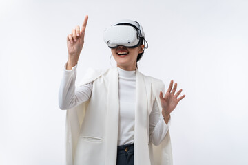 Happy young Asian businesswoman working in virtual reality environment in VR glasses touching virtual interface isolated on white background.