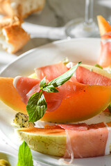 melon with parma and cheese