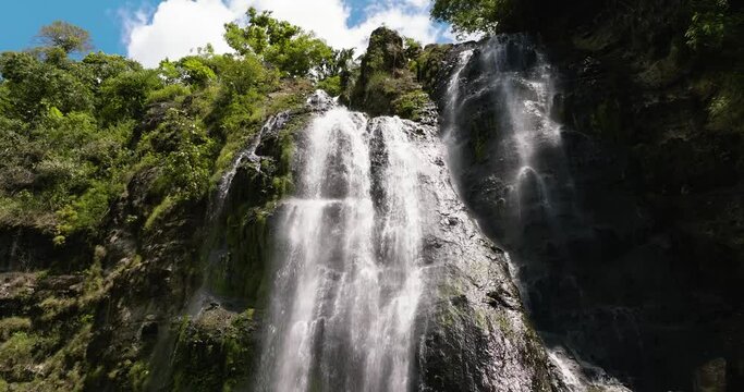 A tropical waterfall in the jungles. Balea Falls in the jungle. Negros, Philippines.