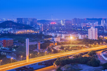 Fototapeta na wymiar Overlooking modern urban architecture and urban night view of Jiangyin City, Jiangsu Province, China