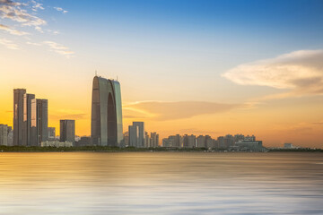 The skyline of modern urban architecture and the scenery of Taihu Lake in Suzhou, Jiangsu Province, China