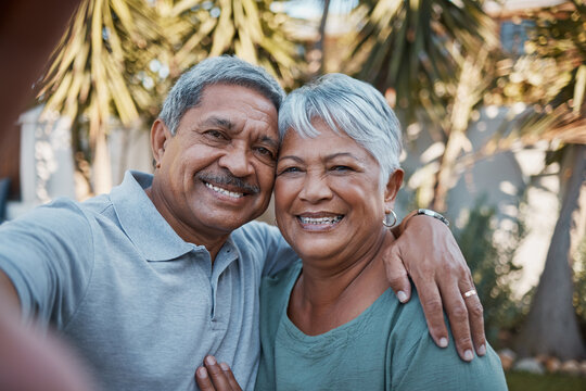 Senior couple, hug and smile for selfie, social media or profile picture together for romance in the back yard. Portrait of happy elderly man and woman smiling in happiness for photo or relationship