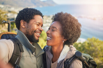 Love, nature and selfie, couple hiking on mountain for fitness, fun and romantic walk in natural landscape. Romance, hiker man and black woman talking self portrait with smile in mountains on island.