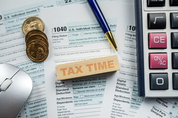 closeup blank Tax return form 1040 with us coin cent