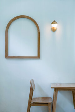 decore in cafe , on the white wall , chair and table