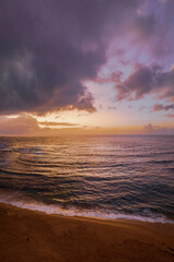 Rainy day sunrise seascape with clouds