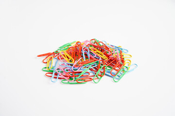 Obraz na płótnie Canvas Paper clips colorful isolated on white background, office equipment.