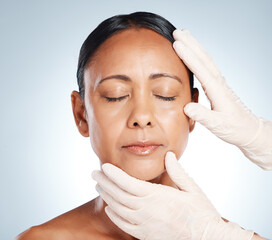 Botox, plastic surgery and hands check woman face for laser, cosmetics implant or beauty salon....