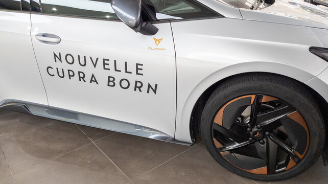 Seat Cupra Born New Model In Showroom Dealership With Logo Text And Sign Brand On Side Car EV Electric Vehicle