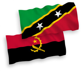 Flags of Federation of Saint Christopher and Nevis and Angola on a white background