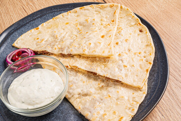 traditional flatbread with dip and herbs