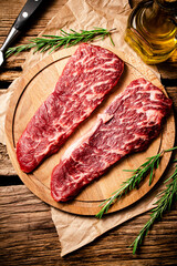 Raw steak on a cutting board. 