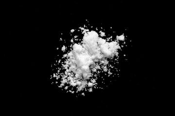 Obraz premium White snow isolated on black background close up