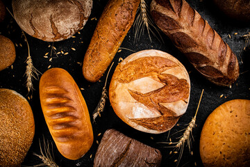 Different types of fresh bread on the table. 