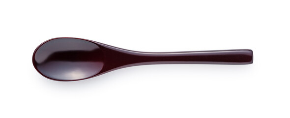 Lacquered spoons placed on a white background.