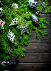 Fir branches with Christmas decorations.
