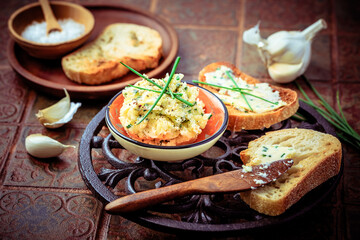 Homemade garlic bread or baguette slices with garlic butter and herbs