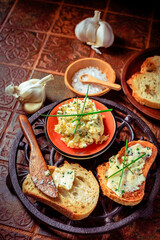 Homemade garlic bread or baguette slices with garlic butter and herbs