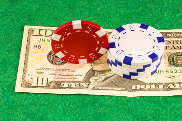 One banknotes and casino chips corresponding to the nominal value