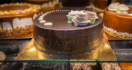 Lovely decorated chocolate cake, for sale in a pastry shop
