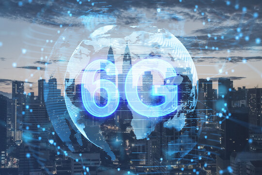 Creative glowing 6g hologram on blurry city backdrop. 5G network concept, high speed mobile internet, new generation networks. Mixed media. Double exposure.