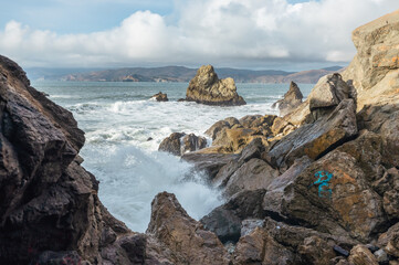 Rocky sea cliffs, beautiful dramatic seascape of pacific bay, california, usa