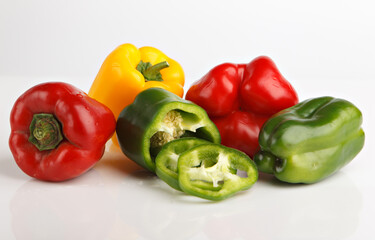 Fresh vegetables A few sweet Red, Yellow, Green Peppers isolated on white background