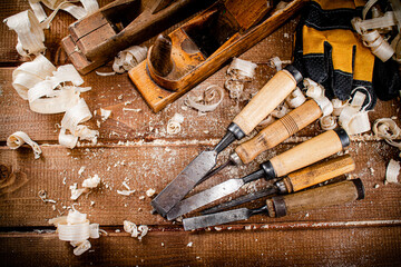 Various working tools on wood on the table. 