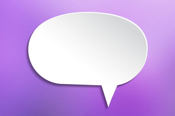 Empty white speech bubble on purple background