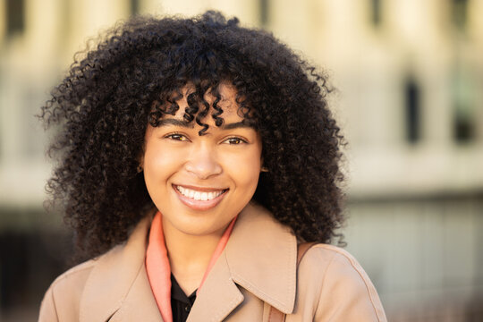 Black Woman, Smile Portrait And City Travel While Happy Outdoor On London Street With Freedom. Face Of Young Model Person With Natural Afro Hair, Beauty And Fashion Style During A Walk On Holiday