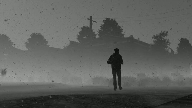 silhouette of a man walking in the snow