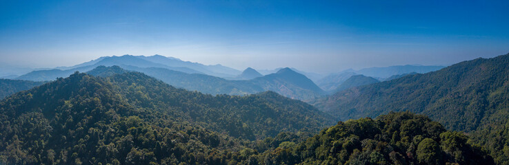 Fototapeta premium Aerial panorama view of rolling hill mountain from 1715 view point at Doi Phu Kha National Park, Nan province, Thailand