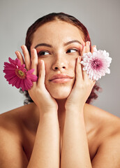 Woman, studio and face with flowers for thinking, beauty or healthy skincare for natural spring...