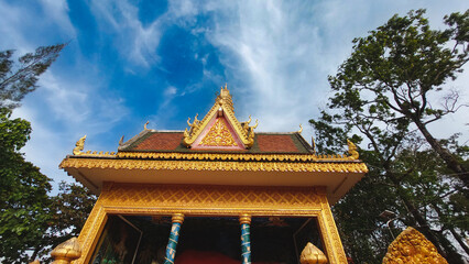 Low angle view of Wat Traeuy Kaoh Buddhist temple on Fish Island in Kampot, Cambodia