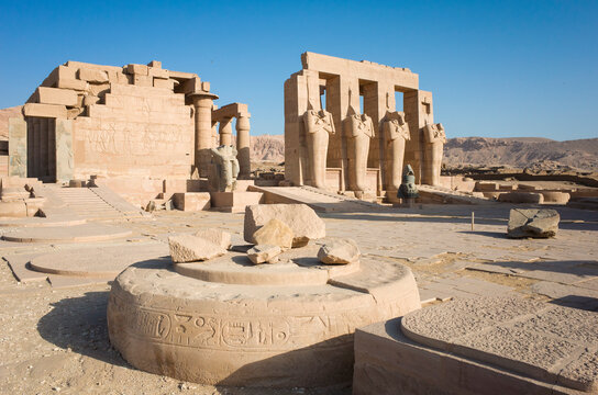 Luxor, Egypt - October 5, 2022: Ramesseum temple round column bases, Ruined structures of the second pylon of memorial temple (or mortuary temple) of Pharaoh Ramesses II in Theban Necropolis
