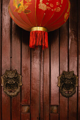 chinese red door with lantern