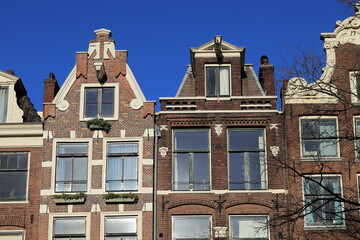 Amsterdam Bloemgracht Canal Typical House Facades with Blue Sky Close Up, Netherlands
