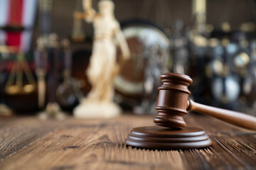 Law concept. Jugde’s gavel on rustic wooden desk.