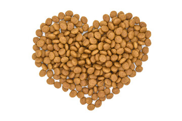 Cat dry food in heart shape on white background.  Love and Valentine day concept. 