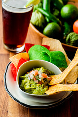 Guacamole, salsa and chips. Avocado dip, spread, or salad.  Avocados diced mixed with salsa, lemon and lime juices, cilantro, onions, jalapeños, tomatoes. Classic Tex-Mex or Mexican dip with salsa.