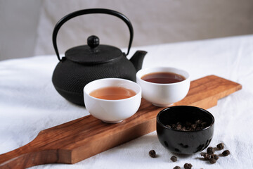 two cups of tea and a teapot