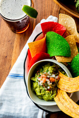 Guacamole, salsa and chips. Avocado dip, spread, or salad.  Avocados diced mixed with salsa, lemon and lime juices, cilantro, onions, jalapeños, tomatoes. Classic Tex-Mex or Mexican dip with salsa.
