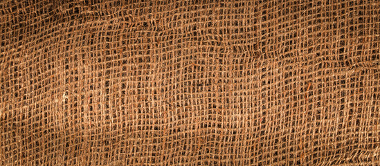 texture of a brown canvas fabric background	
