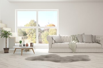 Stylish room in white color with sofa and autumn landscape in window. Scandinavian interior design. 3D illustration