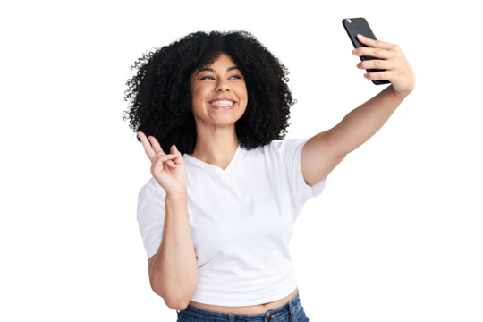 An attractive young woman using a smartphone to take selfies isolated on a PNG background.