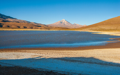 Fototapeta na wymiar Landscape with volcano and lake, Isluga National Park in Chile